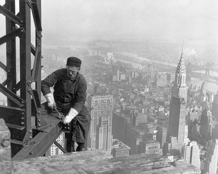 worker on empire state